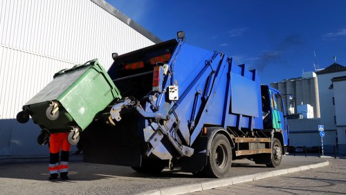 Company representative receiving a complaint about commercial waste service