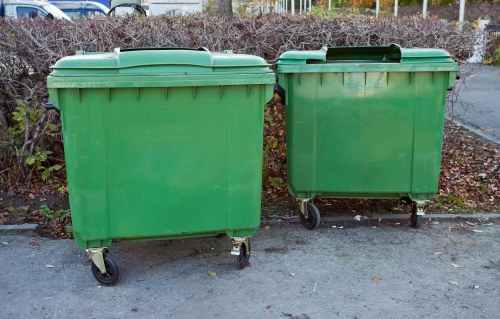 Construction site with builders removing waste