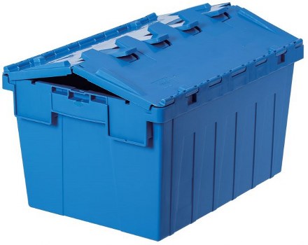 A large blue plastic waste storage box with a hinged, slightly open lid, situated outdoors on a paved driveway or pavement. The container has a textured surface with vertical ridges and is made of durable, weather-resistant polypropylene. It is positioned in the foreground with the open lid revealing the interior space, and appears to be part of a commercial waste collection setup. The background shows a neutral outdoor environment, possibly in a suburban or town area near Kingston, with natural lighting that highlights the container's surface and color. The image is relevant to waste removal services provided by Commercial Waste Kingston, focusing on rubbish storage solutions for businesses or commercial properties in the local area.